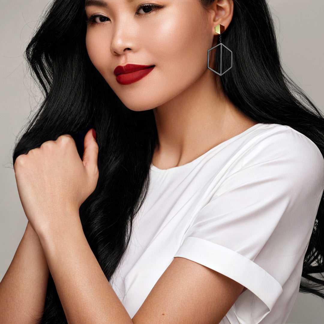 Naude Bourn's Illuminate You dangle earring accessory in black gold with Yellow Gold Know You Stud Earrings featuring a bold and striking design that makes a dramatic statement of elegance.